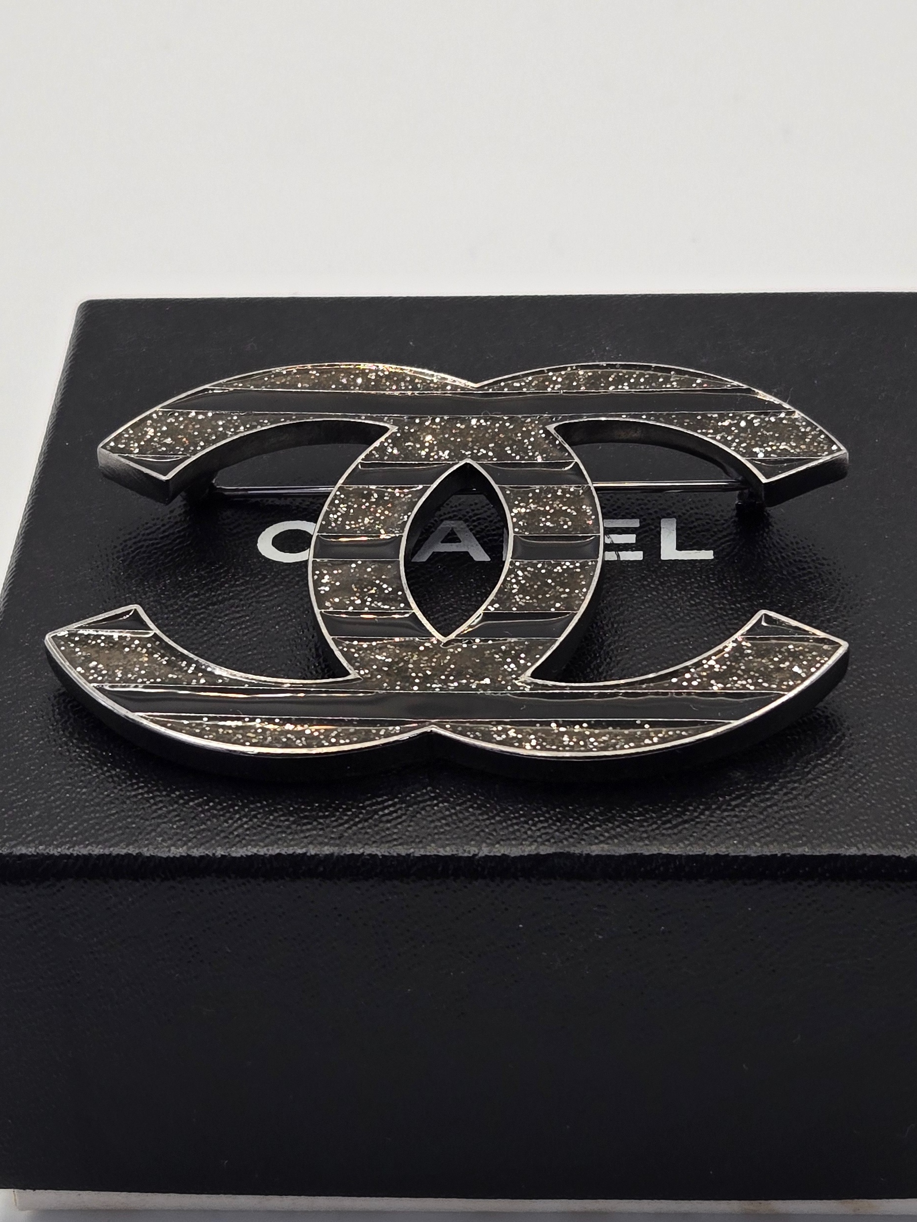 Chanel 2010C striped silver and black CC brooch