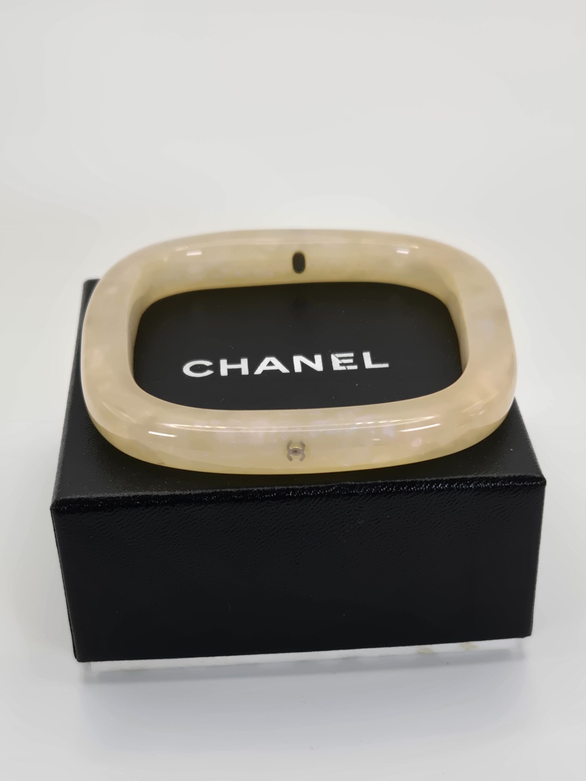 Chanel 99A cream square bangle resin with subtle sparkle 2.6 inch opening