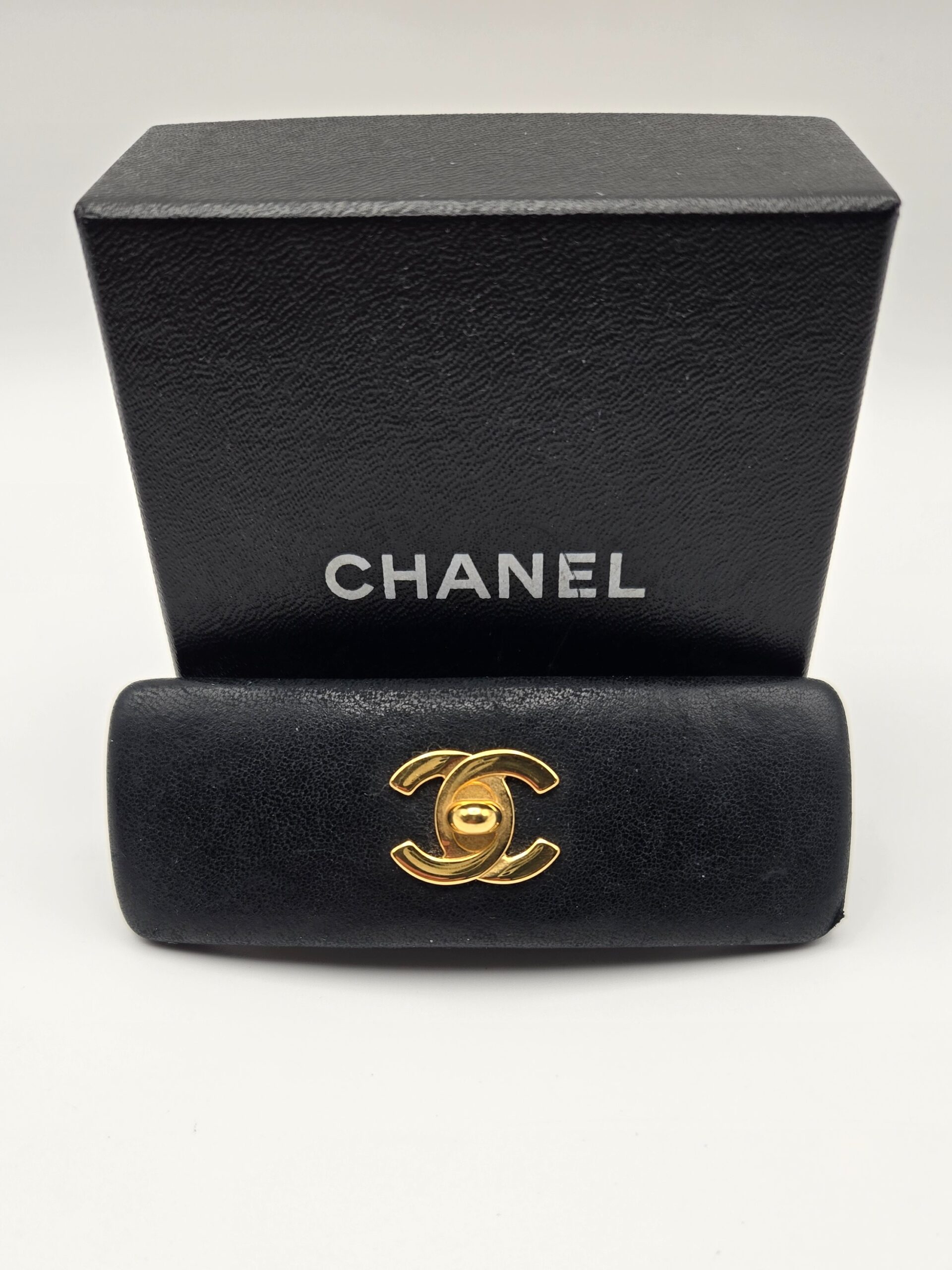 Chanel vintage turnlock CC barrette black leather gold logo hair accessory 90s