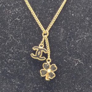 Chanel gold necklace with black clover charm and CC logo 07P