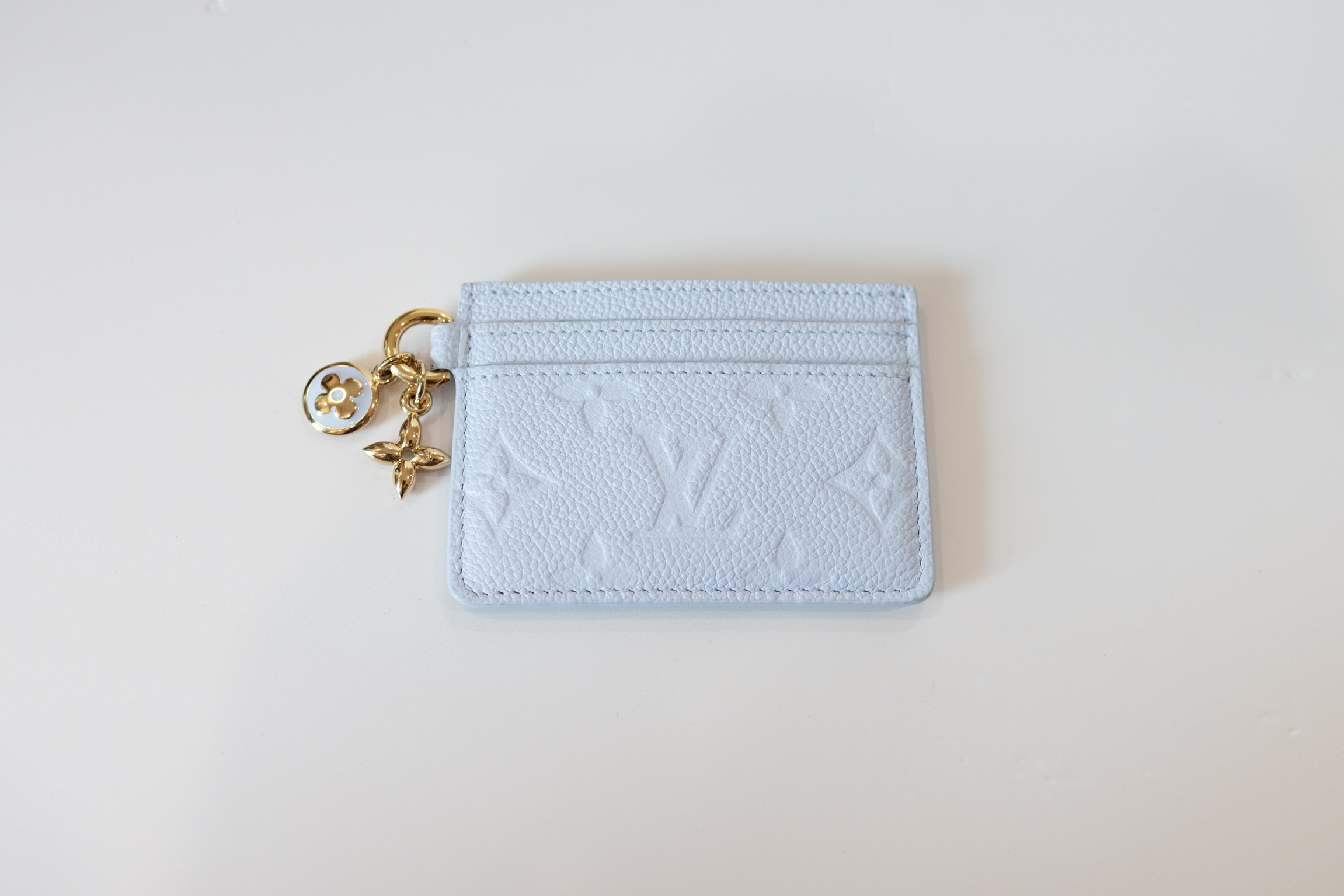 Louis Vuitton Light Blue Monogram Empreinte Card Holder with Gold-Tone Charms