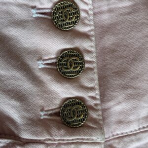 Chanel 2019 Cruise pink high-waisted lace-up shorts with CC buttons and tweed side ties